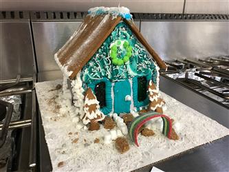 A green gingerbread house